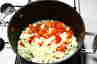 Torskefilet i tomatflødesovs med rejer, fetaost og hvidløg, billede 1